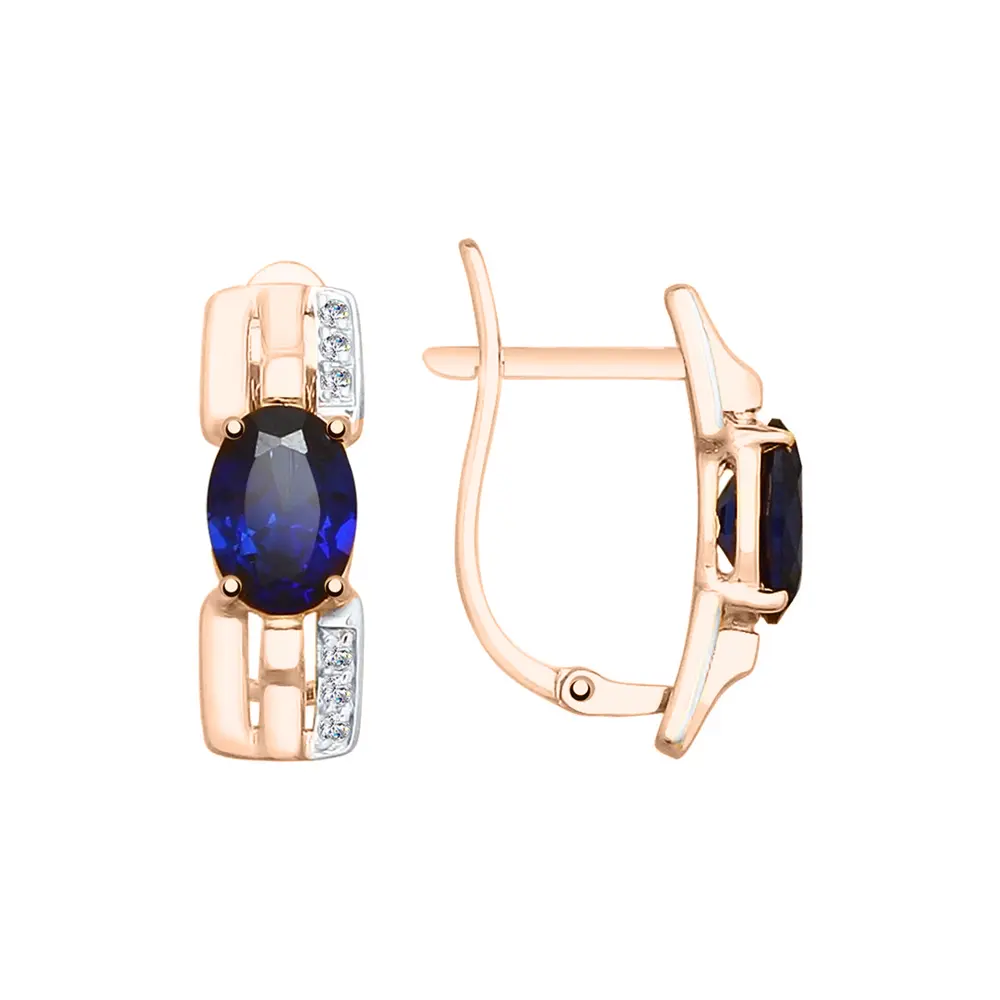 Artikelbild 1 des Artikels “Ohrhänger „Blauer Ovalstein mit Gliedern“ aus 585 Rotgold mit Zirkonia und Saphir (synthetisch) “