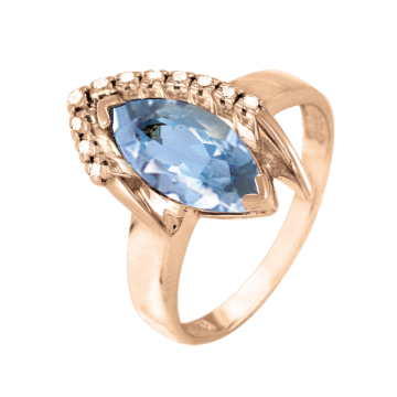 Lady´s ring in red gold of 585 assay value with blue topaz, zirconia 