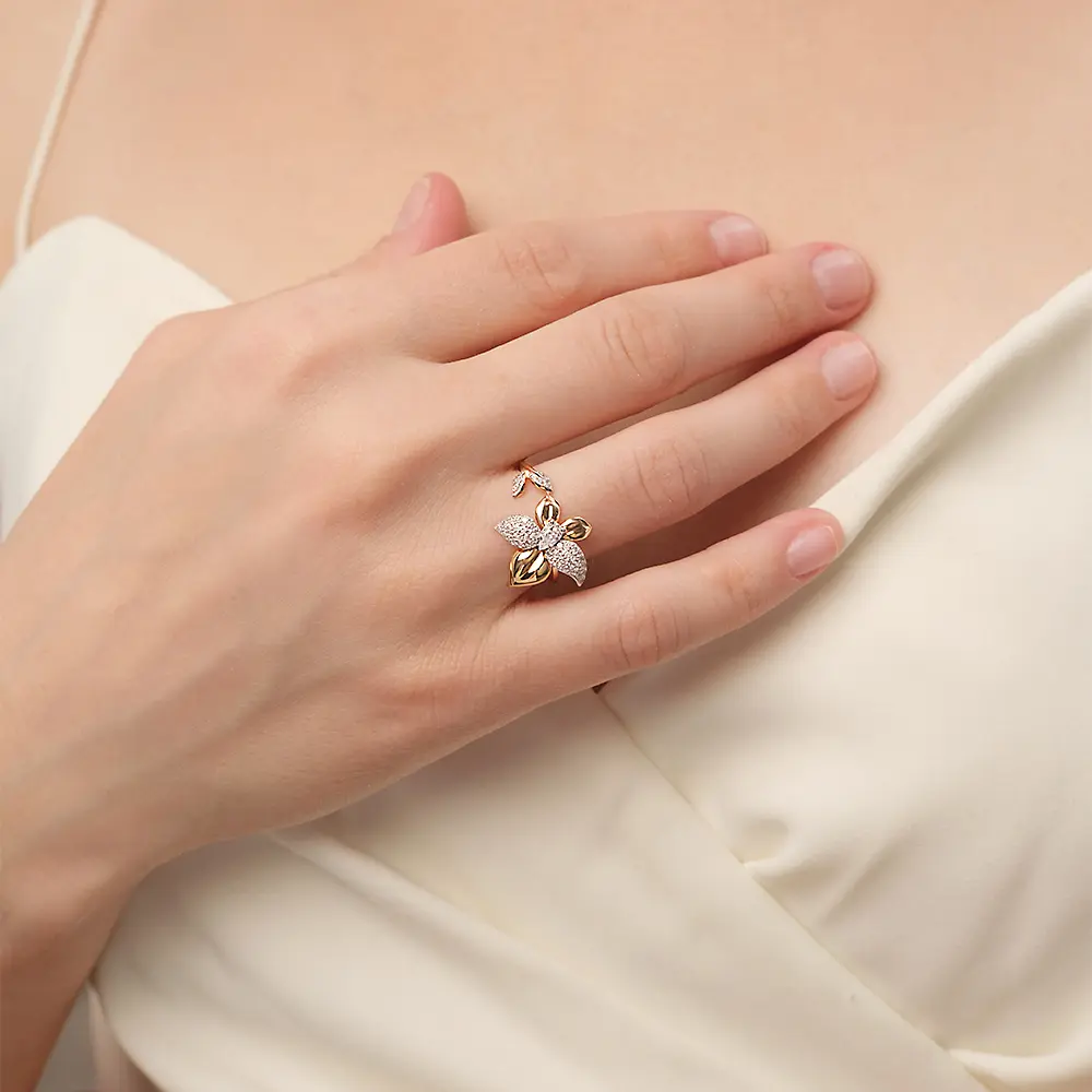 Artikelbild des Artikels “Damenring „Blüte mit Blättern“ aus 585 Bicolor-Gold mit Zirkonia “