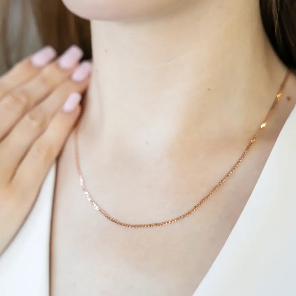 Artikelbild des Artikels “Diamantierte Gliederkette aus 585 Rotgold “