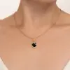 Artikelbild 2 des Artikels “Anhänger „Rund mit Blattschwung“ aus 585 Rotgold mit Onyx “